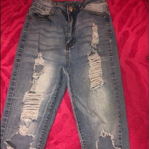 light blue ripped jeans